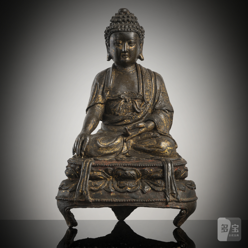 A bronze figure of Buddha Shakyamuni